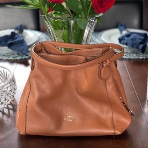 Coach, brown leather shoulder bag.